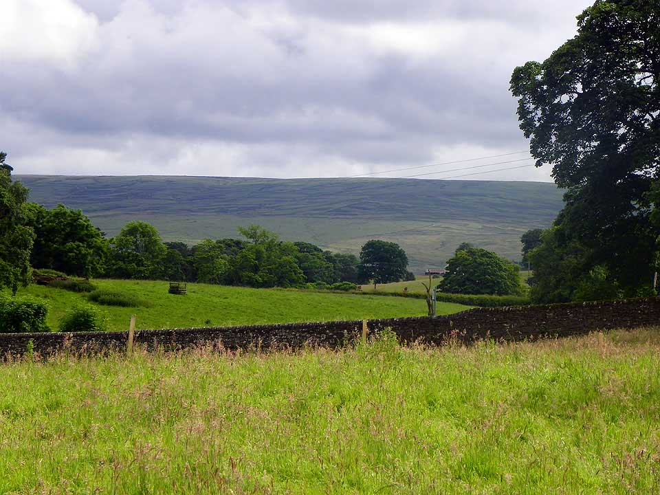The site in the foreground with view towards the Pennine Hills